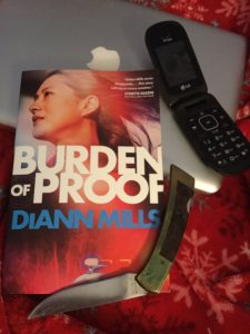 <i>Burden of Proof</i> <br> <h4>by Diann Mills</h4>